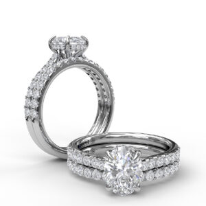 Classic Oval Cut Engagement Ring with a Subtle Diamond Splash