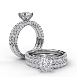 Diamond-Encrusted Engagement Ring with Oval Center Stone