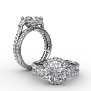 Round Diamond Halo Engagement Ring With Pear-Shape Side Stones