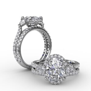 Oval Diamond Halo Engagement Ring With Pear-Shape Diamond Side Stones