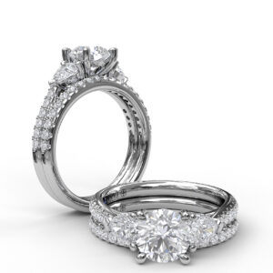 Three-Stone Engagement Ring With Pear Cut Side Stones