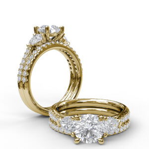 Three-Stone Engagement Ring With Pear Cut Side Stones