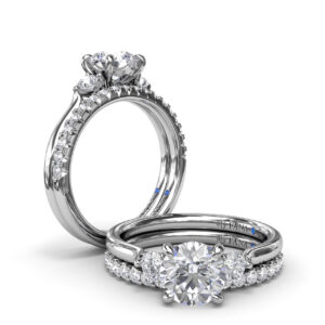 Brilliant Cut Three Stone Engagement Ring